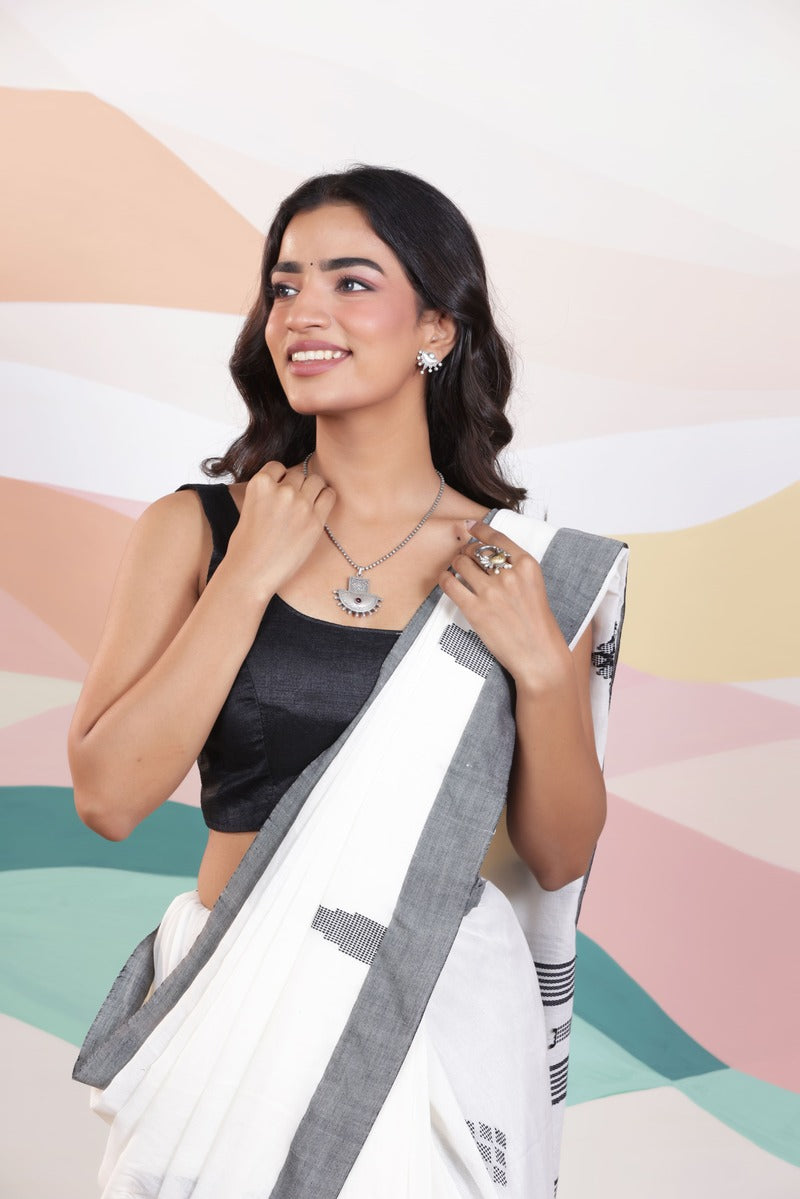 ARTISAN THREAD KHADI SAREE IN WHITE WITH BLACK WEAVES AND BLACK BORDER