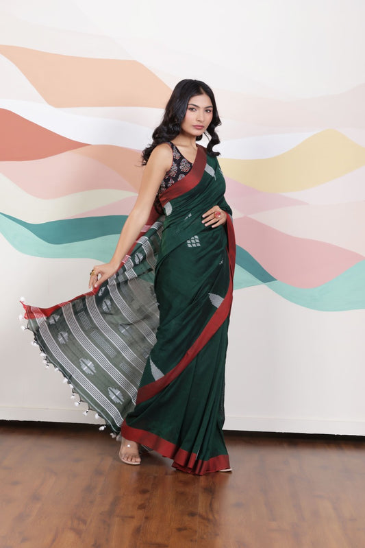 ARTISAN THREAD KHADI SAREE IN GREEN WITH WHITE WEAVES AND CONTRAST RED BORDER