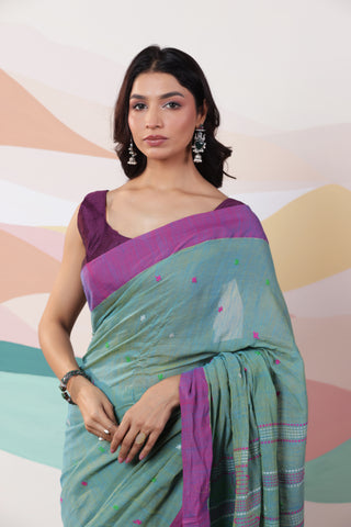 ARTISAN WOVEN LIGHT GREEN THREAD KHADI SAREE WITH COLOURFUL THREADED BUTTAS AND CONTRAST BORDER