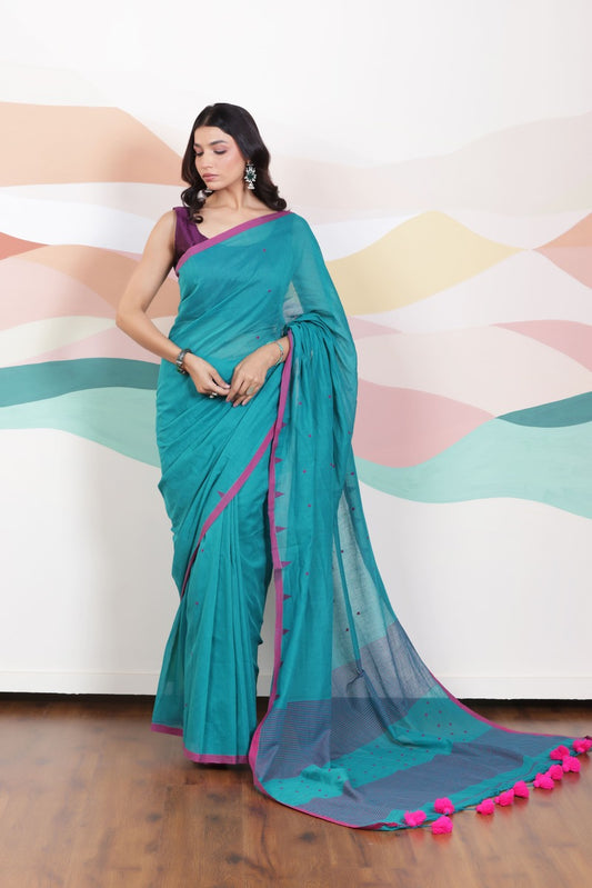 ARTISAN WOVEN THREAD KHADI SAREE IN ELEGANT DEEP GREEN WITH DELICATE BUTTA WEAVES AND CONTRAST TASSELS