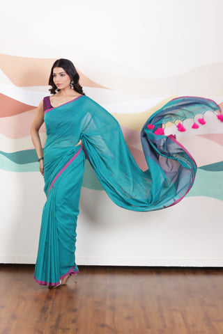 ARTISAN WOVEN THREAD KHADI SAREE IN ELEGANT DEEP GREEN WITH DELICATE BUTTA WEAVES AND CONTRAST TASSELS