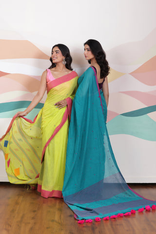 ARTISAN WOVEN THREAD KHADI SAREE IN ELEGANT DEEP GREEN WITH DELICATE BUTTA WEAVES AND CONTRAST TASSELS