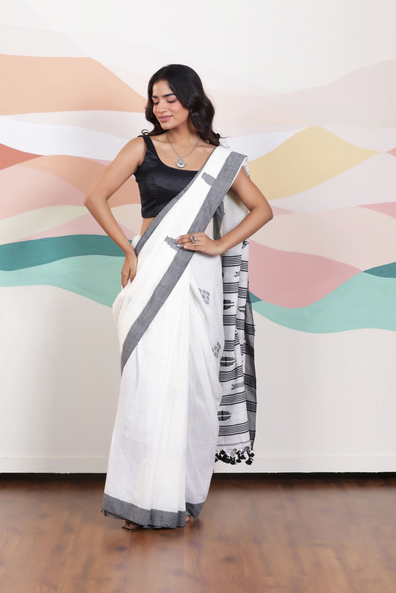 ARTISAN THREAD KHADI SAREE IN WHITE WITH BLACK WEAVES AND BLACK BORDER