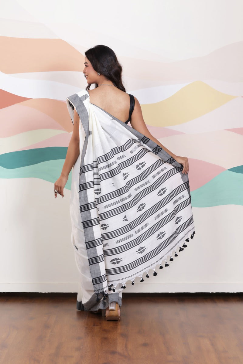 ARTISAN THREAD KHADI SAREE IN WHITE WITH BLACK WEAVES AND BLACK BORDER