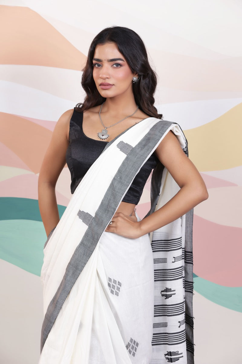 ARTISAN THREAD KHADI SAREE IN WHITE WITH BLACK WEAVES AND BLACK BORDER