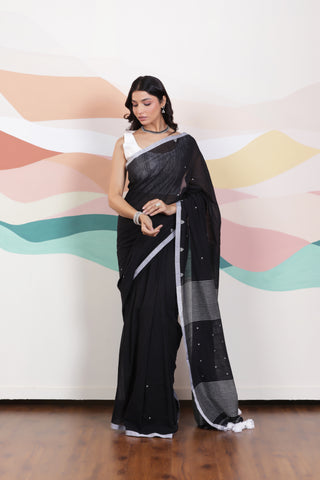 ARTISAN WOVEN THREAD KHADI SAREE IN ELEGANT BLACK WITH DELICATE BUTTA WEAVES AND CONTRAST TASSELS
