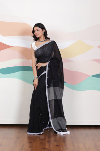 ARTISAN WOVEN THREAD KHADI SAREE IN ELEGANT BLACK WITH DELICATE BUTTA WEAVES AND CONTRAST TASSELS