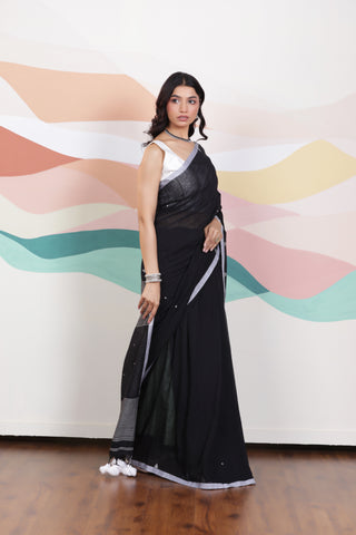 ARTISAN WOVEN THREAD KHADI SAREE IN ELEGANT BLACK WITH DELICATE BUTTA WEAVES AND CONTRAST TASSELS