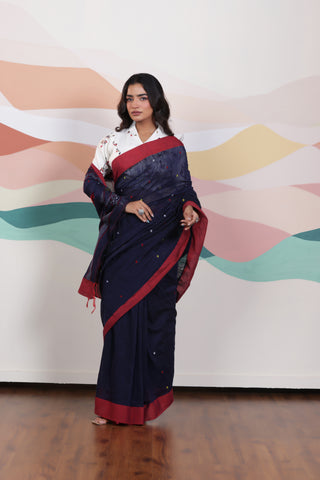 ARTISAN WOVEN NAVY BLUE THREAD KHADI SAREE WITH COLOURFUL THREADED BUTTAS AND CONTRAST BORDER