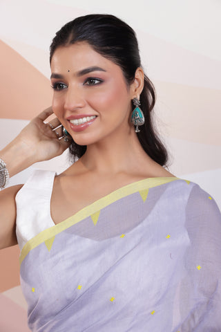 ARTISAN WOVEN THREAD KHADI SAREE IN ELEGANT SKY BLUE WITH DELICATE BUTTA WEAVES AND CONTRAST TASSELS