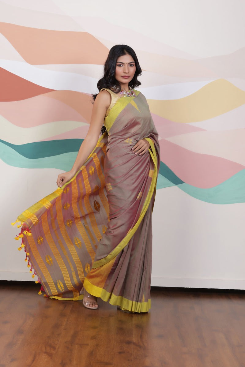 ARTISAN THREAD KHADI SAREE IN RICH BROWN WITH YELLOW WEAVES AND CONTRAST GREEN EDGE