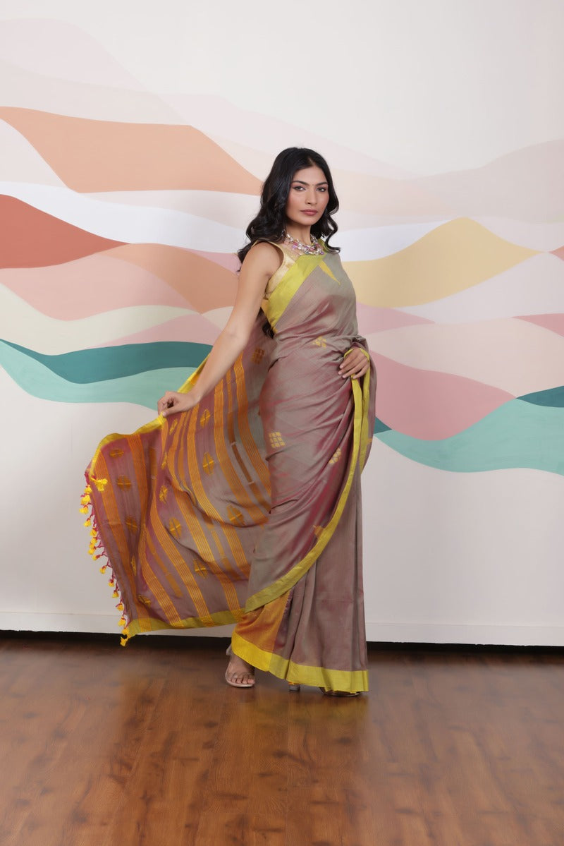 ARTISAN THREAD KHADI SAREE IN RICH BROWN WITH YELLOW WEAVES AND CONTRAST GREEN EDGE