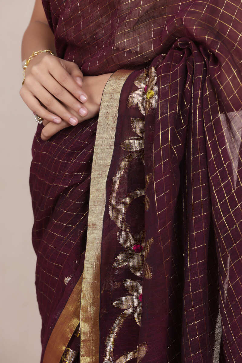 WOVEN LINEN CHECK SAREE IN BROWN WITH FLORAL ELEGANCE