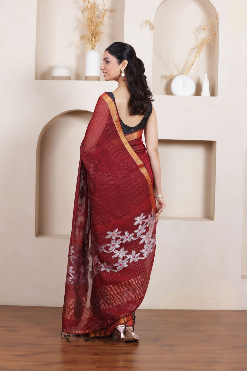 WOVEN LINEN CHECK SAREE IN MAROON WITH FLORAL ELEGANCE