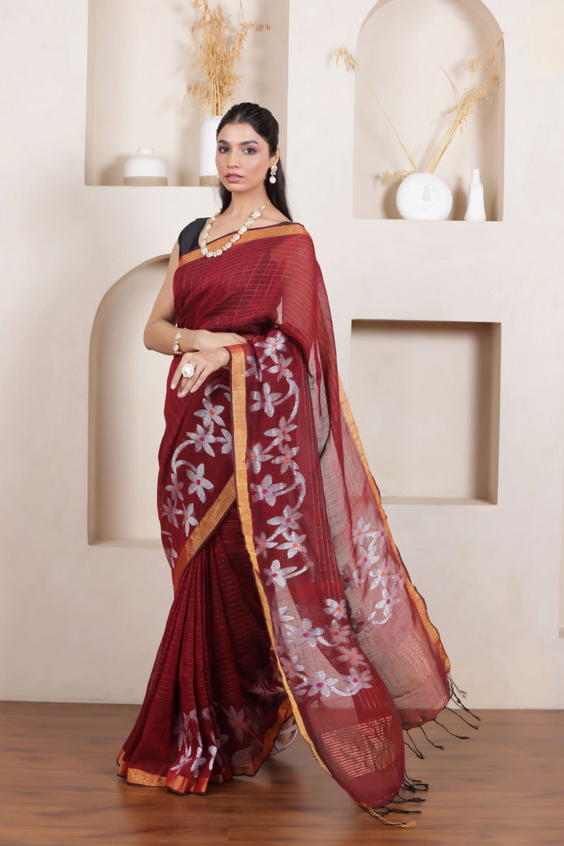 WOVEN LINEN CHECK SAREE IN MAROON WITH FLORAL ELEGANCE