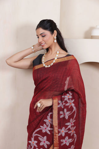 WOVEN LINEN CHECK SAREE IN MAROON WITH FLORAL ELEGANCE