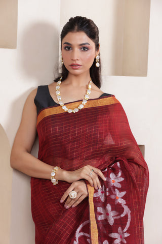 WOVEN LINEN CHECK SAREE IN MAROON WITH FLORAL ELEGANCE