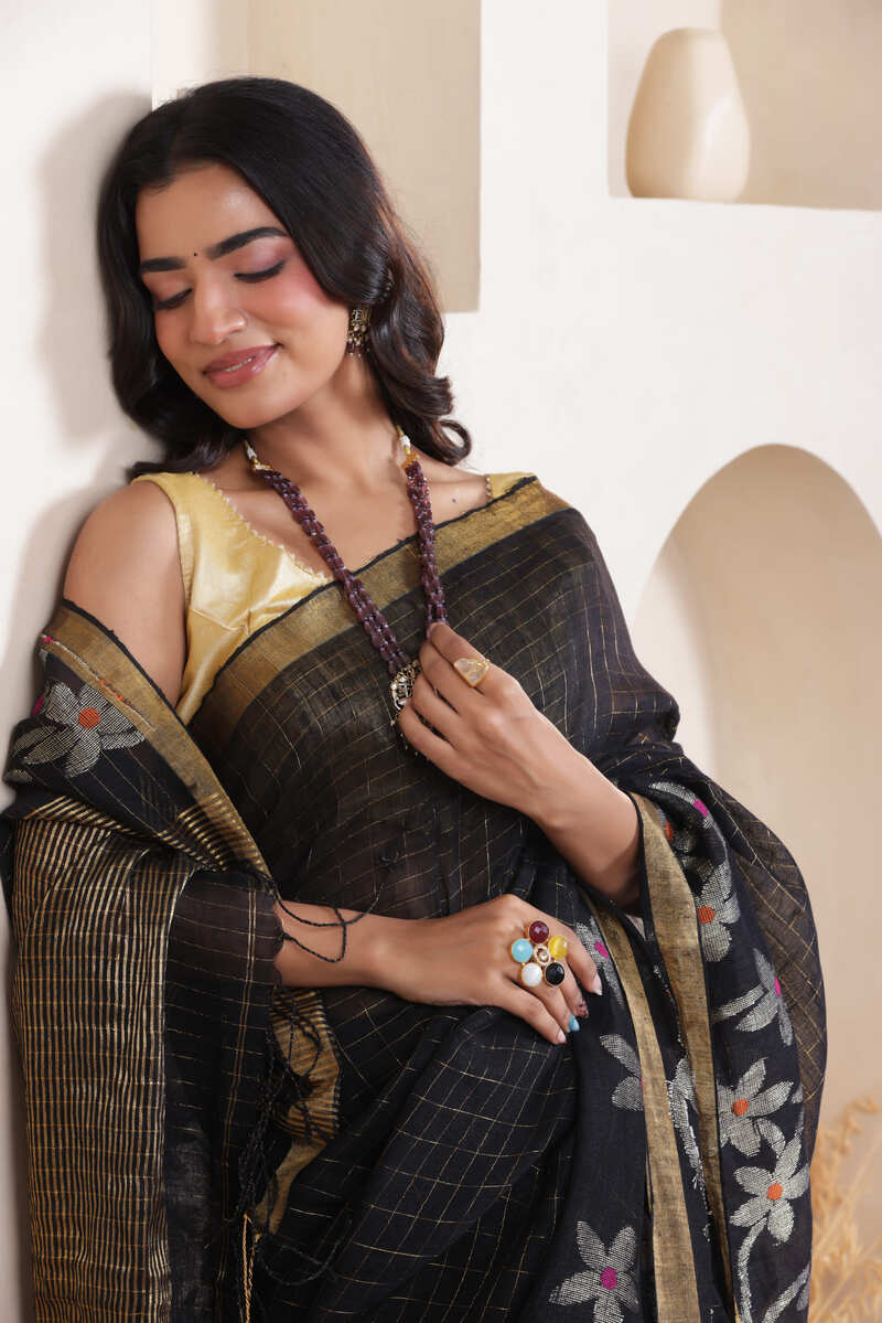 WOVEN LINEN CHECK SAREE IN BLACK WITH FLORAL ELEGANCE