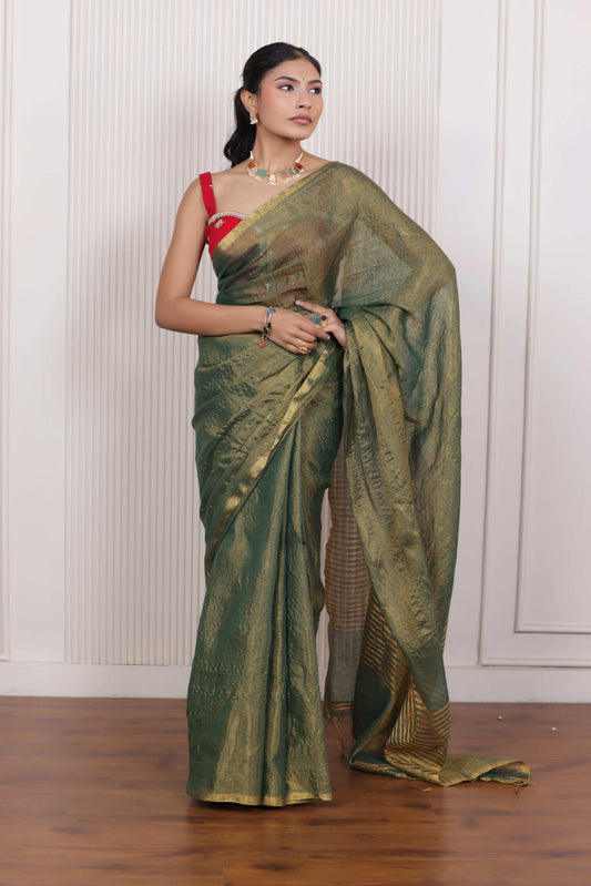 LUXE GREEN LINEN TISSUE SAREE WITH LUSTROUS ZARI STRIPES AND REFINED DRAPE
