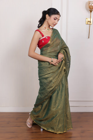 LUXE GREEN LINEN TISSUE SAREE WITH LUSTROUS ZARI STRIPES AND REFINED DRAPE