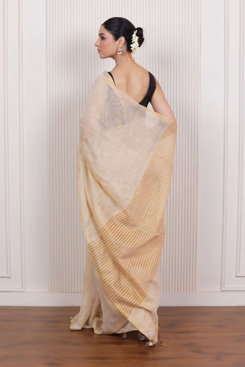 LUXE SANDAL LINEN TISSUE SAREE WITH SUBTLE GOLDEN ACCENTS AND CLASSIC FLOW