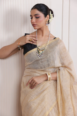 LUXE SANDAL LINEN TISSUE SAREE WITH SUBTLE GOLDEN ACCENTS AND CLASSIC FLOW