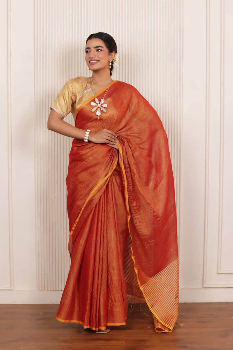 LUXY DARK ORANGE LINEN TISSUE SAREE WITH BOLD ZARI ACCENTS AND STATEMENT PALLU