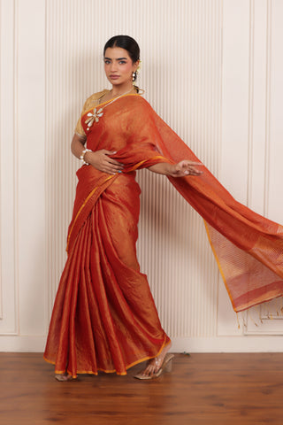 LUXY DARK ORANGE LINEN TISSUE SAREE WITH BOLD ZARI ACCENTS AND STATEMENT PALLU