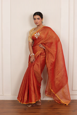 LUXY DARK ORANGE LINEN TISSUE SAREE WITH BOLD ZARI ACCENTS AND STATEMENT PALLU