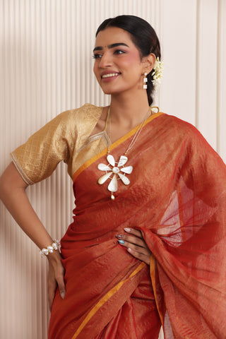 LUXY DARK ORANGE LINEN TISSUE SAREE WITH BOLD ZARI ACCENTS AND STATEMENT PALLU