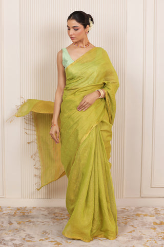 LUXE LIGHT GREEN LINEN SAREE WITH SOFT GOLD HIGHLIGHTS AND FESTIVE FINISH
