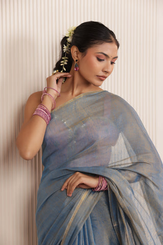 LUXE BLUE LINEN TISSUE SAREE WITH RADIANT GLOW AND MINIMALIST ZARI WORK