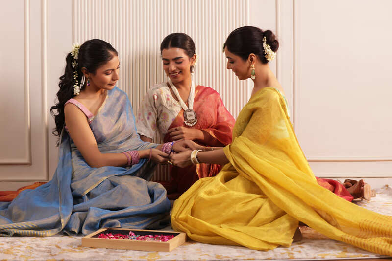 LUXE BLUE LINEN TISSUE SAREE WITH RADIANT GLOW AND MINIMALIST ZARI WORK