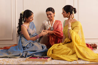 LUXE BLUE LINEN TISSUE SAREE WITH RADIANT GLOW AND MINIMALIST ZARI WORK