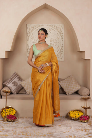 GOLDEN GRACE LUSTROUS TISSUE SAREE WITH ORNATE LACE EMBELLISHMENT