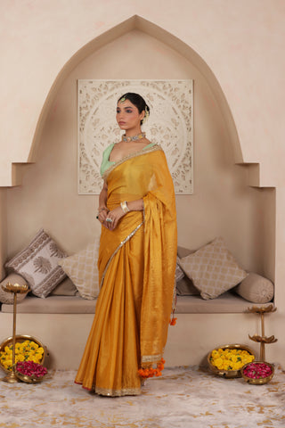 GOLDEN GRACE LUSTROUS TISSUE SAREE WITH ORNATE LACE EMBELLISHMENT