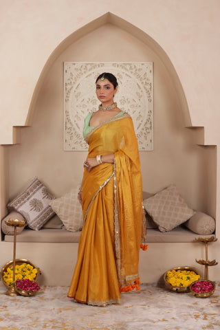 GOLDEN GRACE LUSTROUS TISSUE SAREE WITH ORNATE LACE EMBELLISHMENT