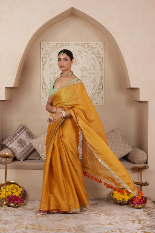 GOLDEN GRACE LUSTROUS TISSUE SAREE WITH ORNATE LACE EMBELLISHMENT
