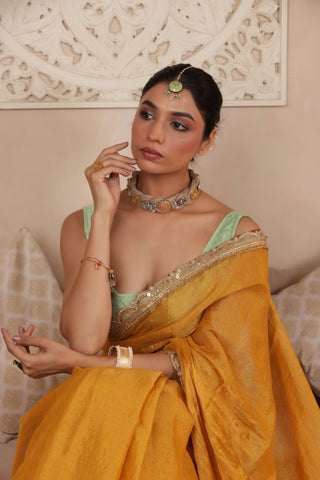 GOLDEN GRACE LUSTROUS TISSUE SAREE WITH ORNATE LACE EMBELLISHMENT