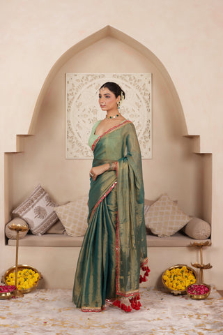 GREEN CHARM LUSTROUS TISSUE SAREE WITH REFINED LACE BORDER