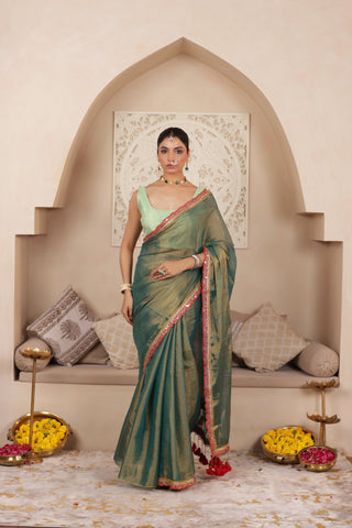 GREEN CHARM LUSTROUS TISSUE SAREE WITH REFINED LACE BORDER