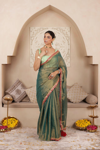 GREEN CHARM LUSTROUS TISSUE SAREE WITH REFINED LACE BORDER