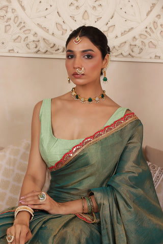 GREEN CHARM LUSTROUS TISSUE SAREE WITH REFINED LACE BORDER