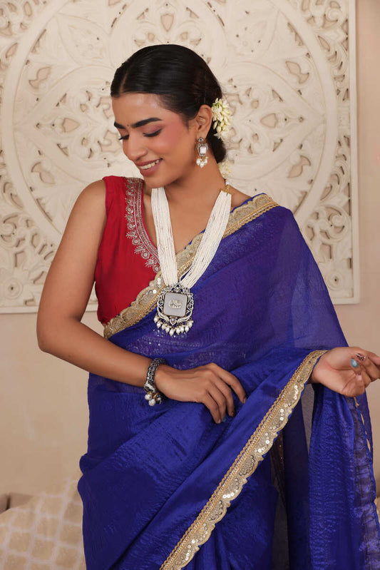 BLUE ELEGANCE LUSTROUS TISSUE SAREE WITH DELICATE LACE DETAILING