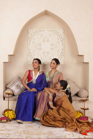 BLUE ELEGANCE LUSTROUS TISSUE SAREE WITH DELICATE LACE DETAILING