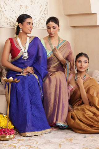 BLUE ELEGANCE LUSTROUS TISSUE SAREE WITH DELICATE LACE DETAILING