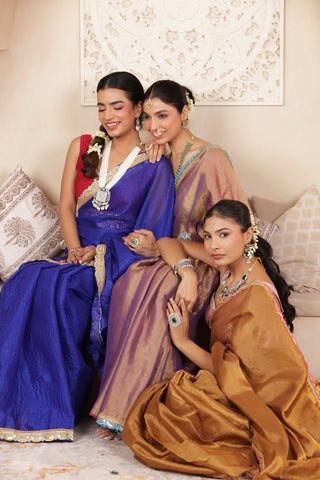 BLUE ELEGANCE LUSTROUS TISSUE SAREE WITH DELICATE LACE DETAILING