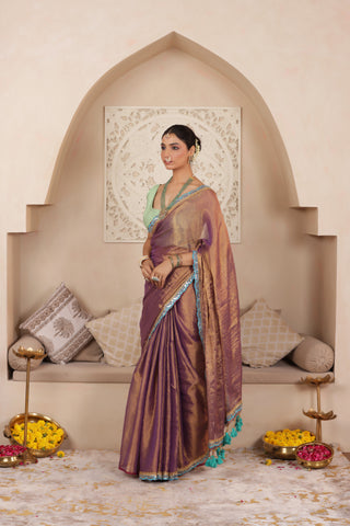 LUSTROUS TISSUE SAREE IN VIOLET WITH BLUE DETAILED WITH BEAUTIFUL LACE WORK
