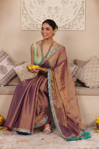 LUSTROUS TISSUE SAREE IN VIOLET WITH BLUE DETAILED WITH BEAUTIFUL LACE WORK