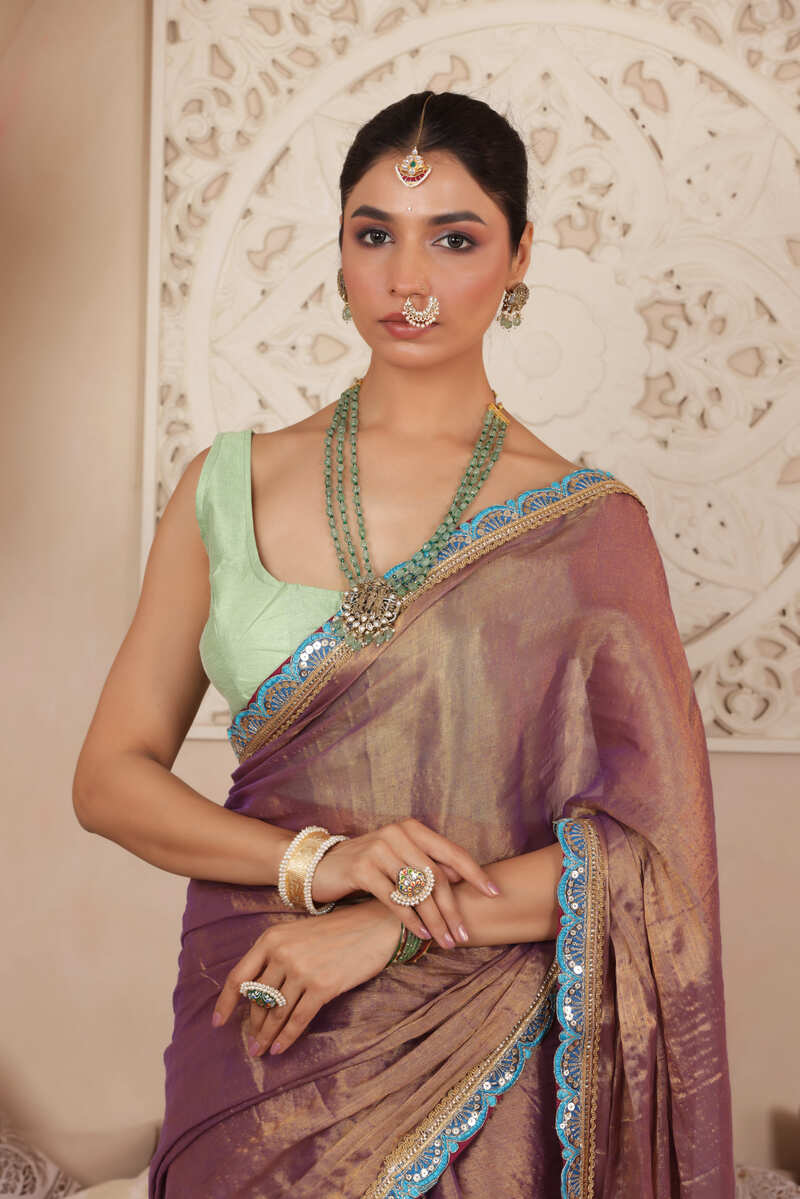 LUSTROUS TISSUE SAREE IN VIOLET WITH BLUE DETAILED WITH BEAUTIFUL LACE WORK